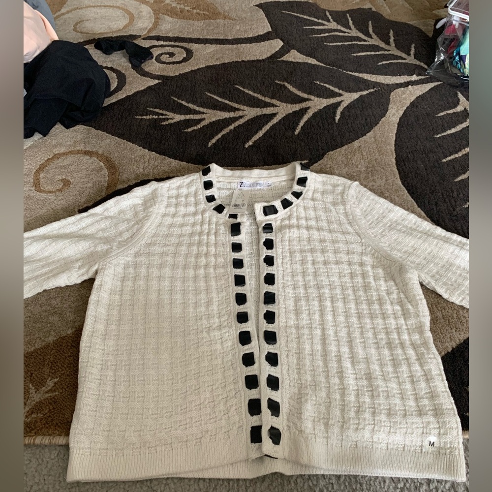 White cardigan w/black stitching
